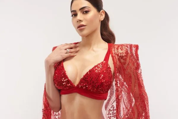 Nikki Tamboli in red outfit